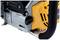View of a chainsaw engine with a yellow housing, black handle, and silver components.
