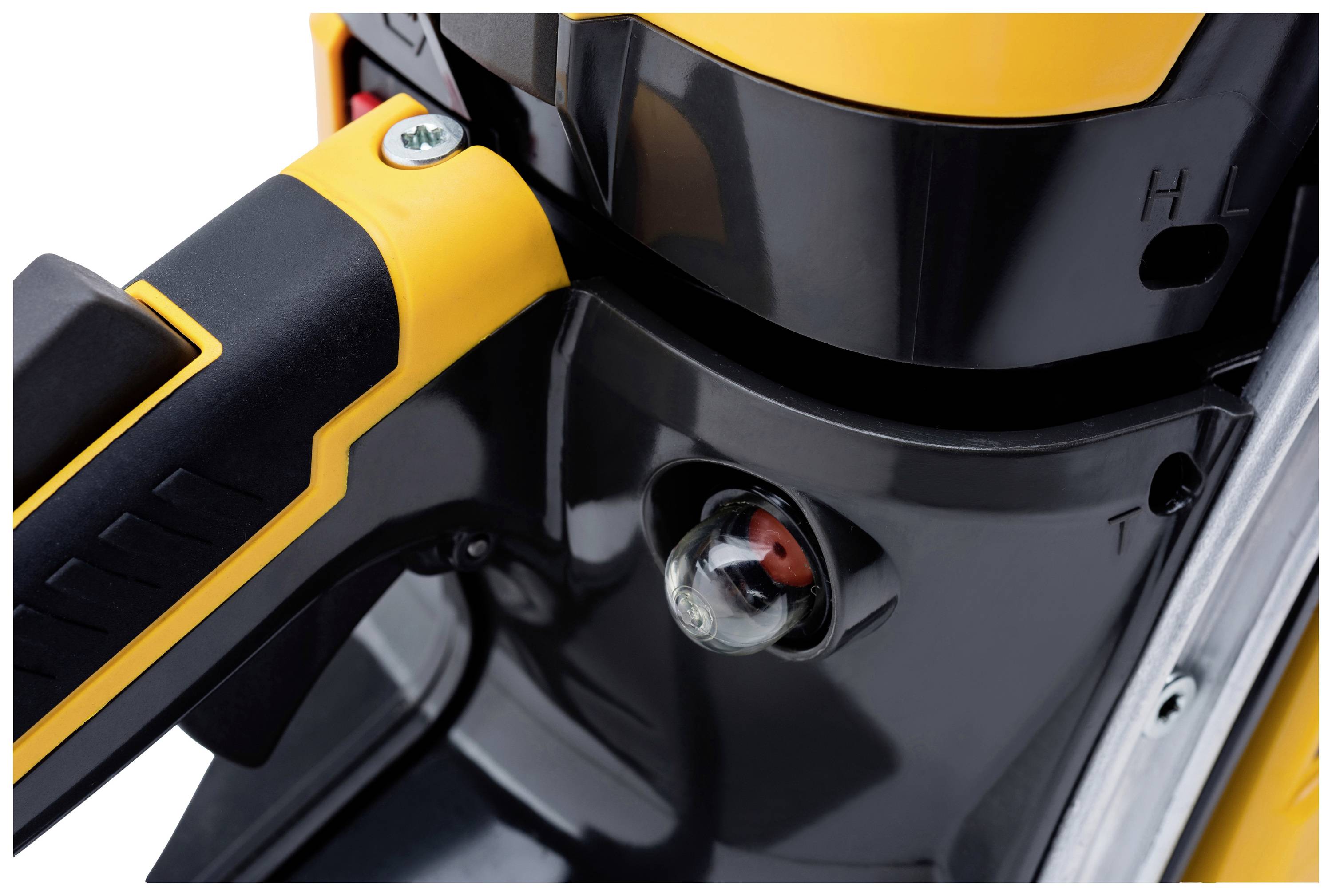 Close-up of a yellow and black device with a visible scale and adjustment knob, likely a power tool or piece of equipment.