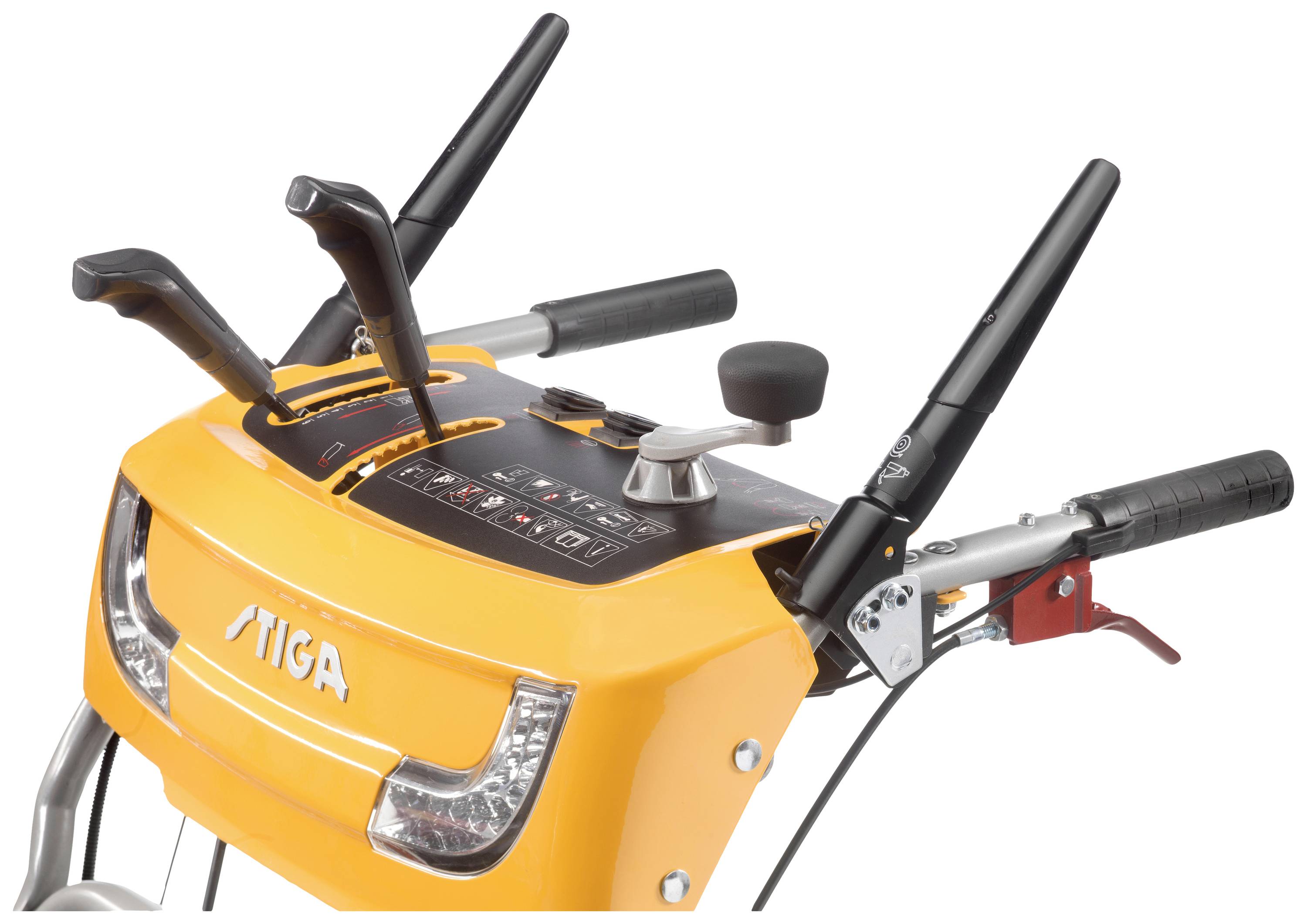 A close-up of a yellow device with levers and buttons, possibly the control panel of a Stiga snow blower model.