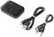 A black Bluetooth receiver with brand logo, two cables: USB charging cable and audio cable with 3.5mm jack plug.