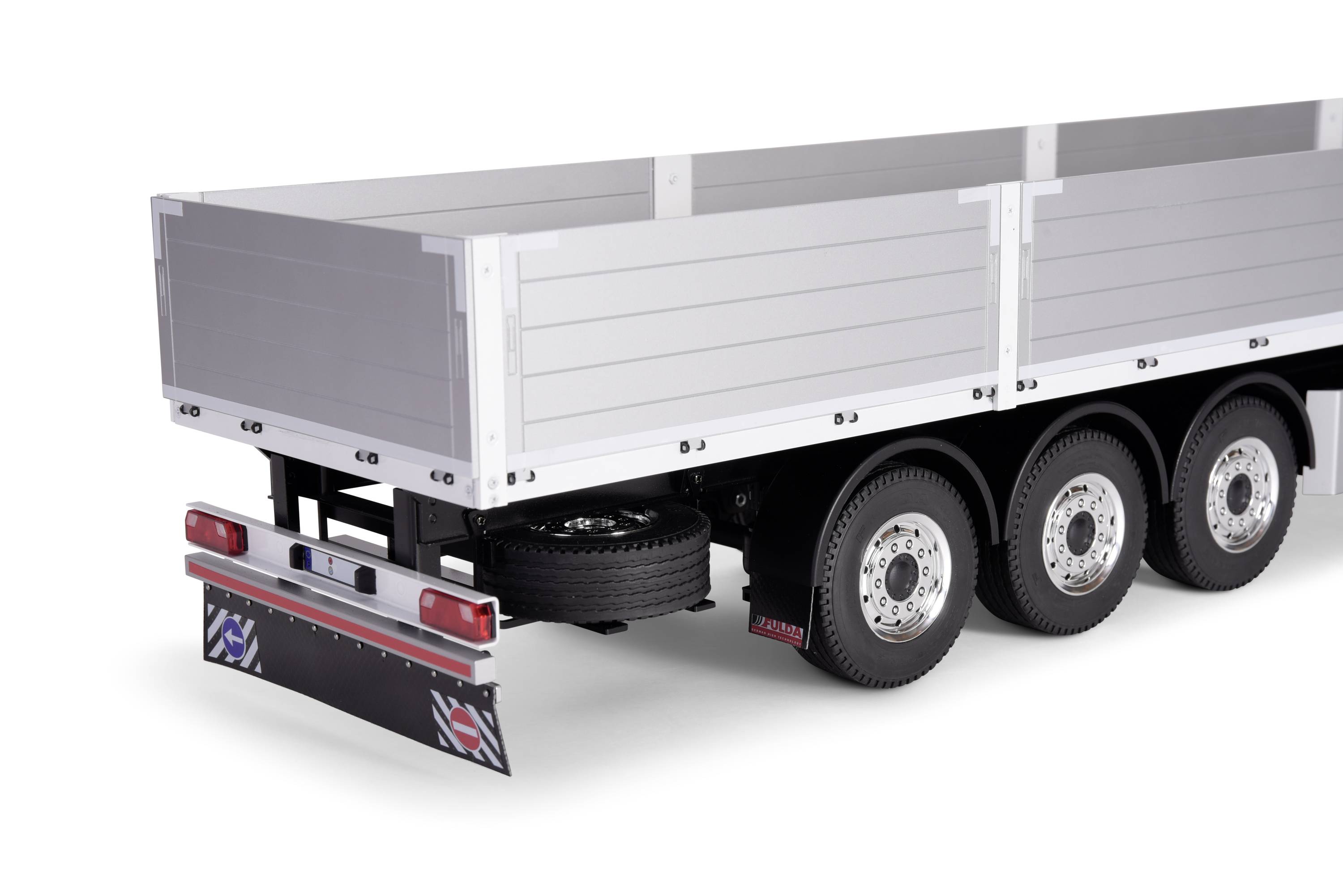 A three-axle lorry trailer with an open loading area and side walls, used for the transportation of goods.