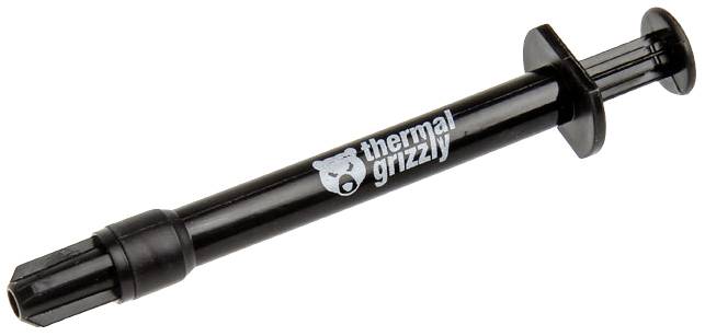 A black syringe with the inscription 'thermal grizzly', used for precisely applying thermal paste.