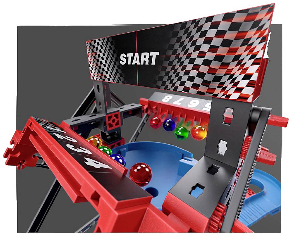 A toy with balls on a race track, shown in a starting position, with a black and white chequered starting line.