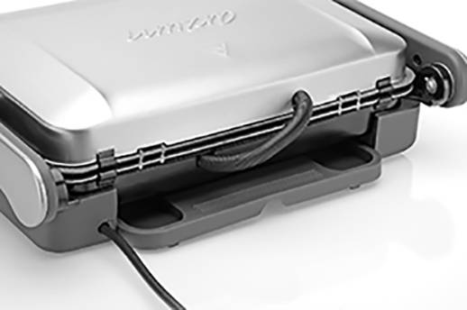 A closed contact grill with a black cable, ideal for sandwiches or paninis.