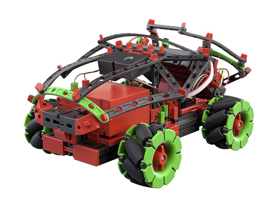 Toy car made from black and green building blocks, with a red body and rotating wheels, demonstrates creative construction.