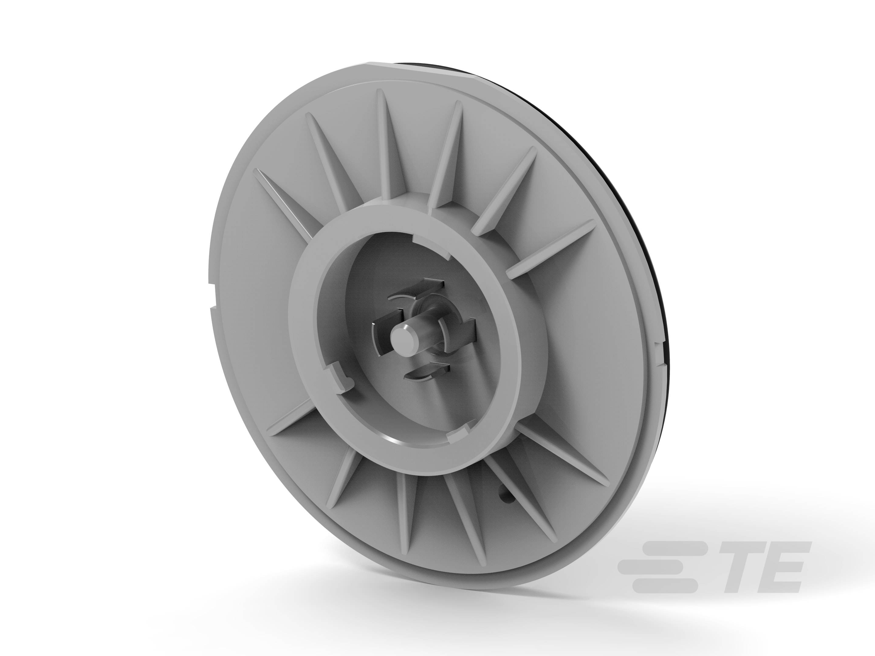 Grey circular construction component with radial ribs on one side and a central mounting point. It is used for mechanical applications.