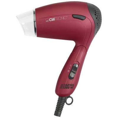 A red travel hairdryer by Clatronic, model Travel 1300 W, with a folding handle and two speed settings.
