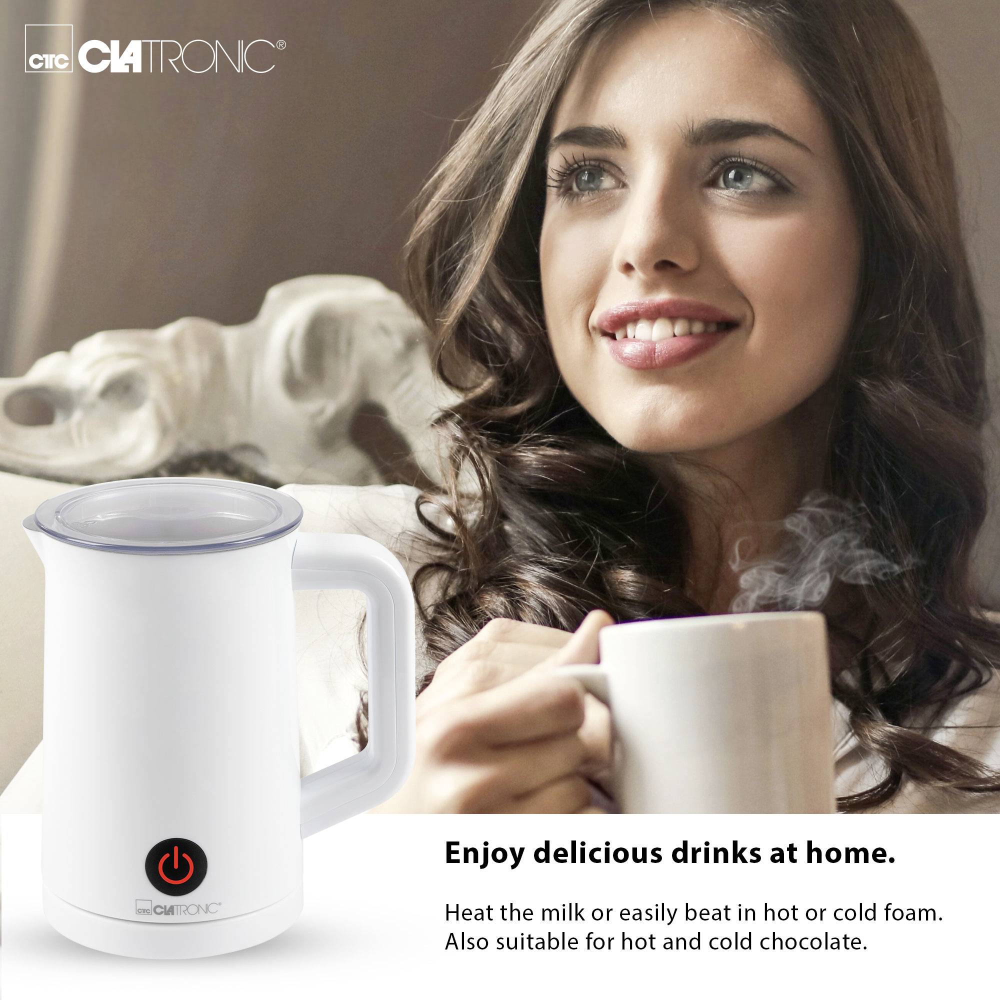 A woman is drinking hot coffee at home. In the foreground is a milk frother by Clatronic, suitable for hot and cold beverages.