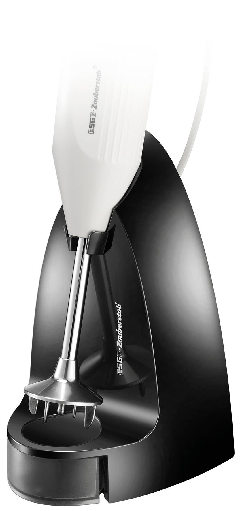 A white hand blender is standing in a black charging station.