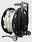 'Hose reel trolley with a rolled-up garden hose. Robust construction with handle and wheels for easy transport and storage.'