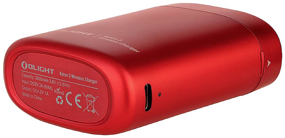 Red, cylindrical wireless charger with USB port. Marked with technical specifications and 'OLIGHT' brand.