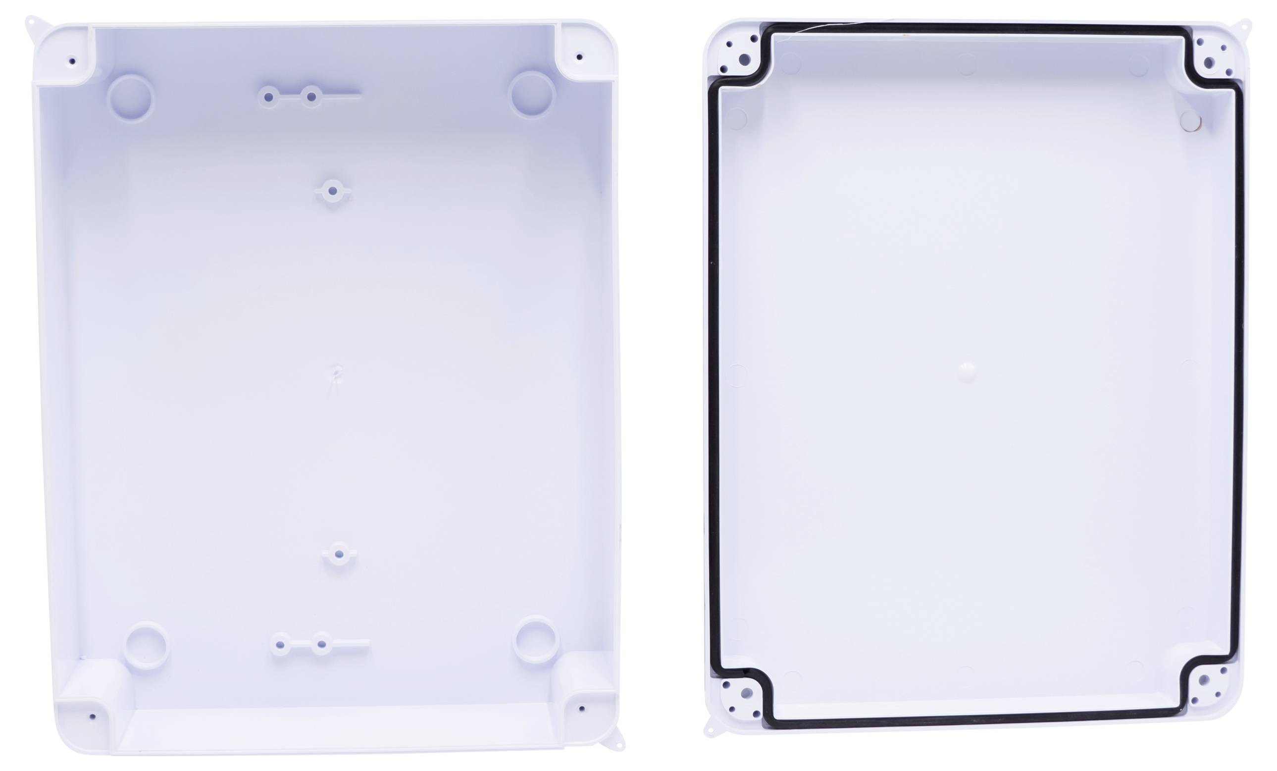 Two white plastic enclosures, shown open, with visible screw points and sealing edges, suitable for electronic assembly.