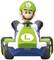 A green racing driver figure is steering a go-kart. The driver is wearing a green helmet with an 'L' on it.