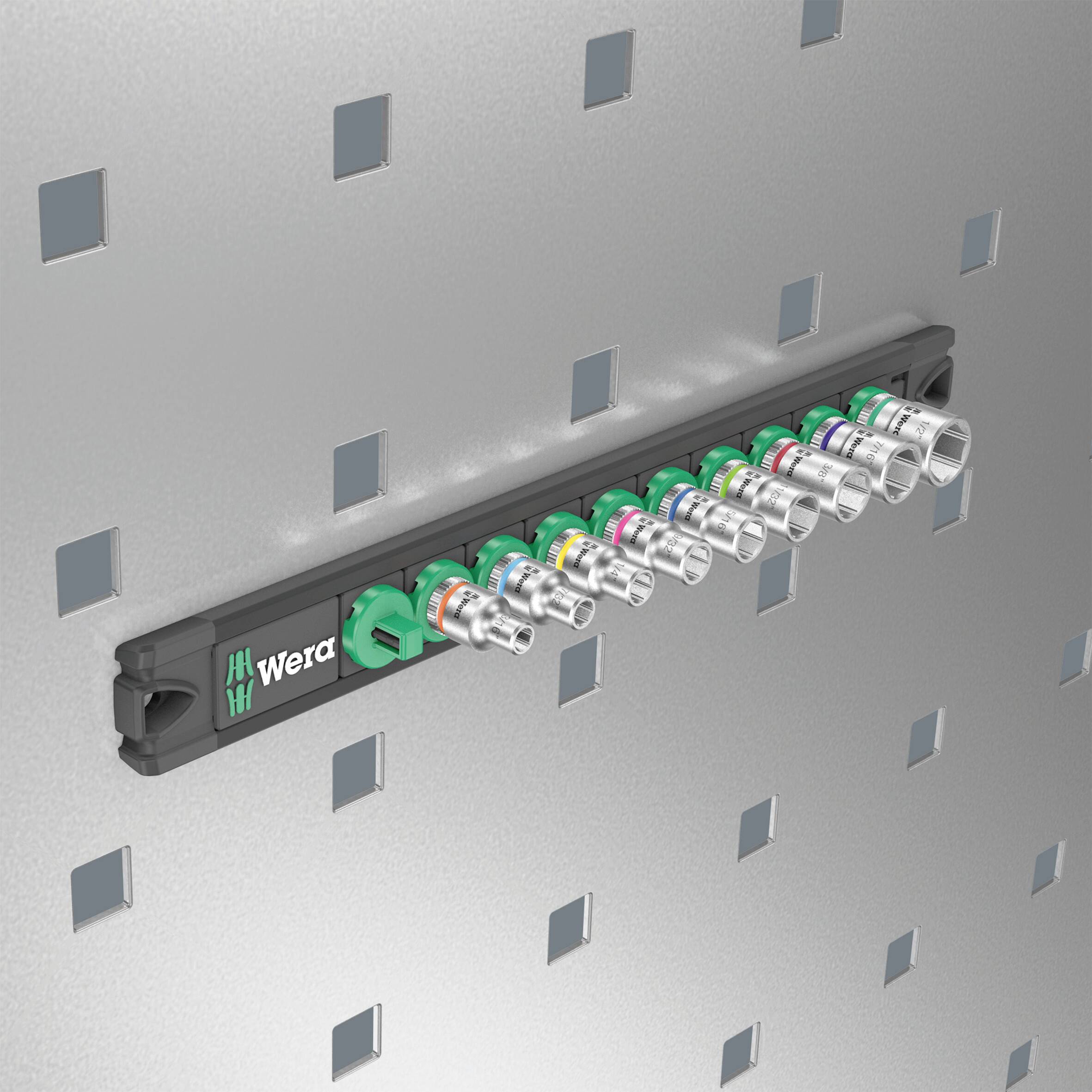 A set of screwed nuts hangs on a perforated plate. The nuts are colour-coded and arranged, ready for use.