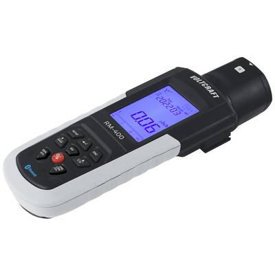 Hand-held measuring device with digital display showing reading '0.06' and date '20.02.2023'. Input buttons underneath. Model 'VOLTCRAFT RM-400'.