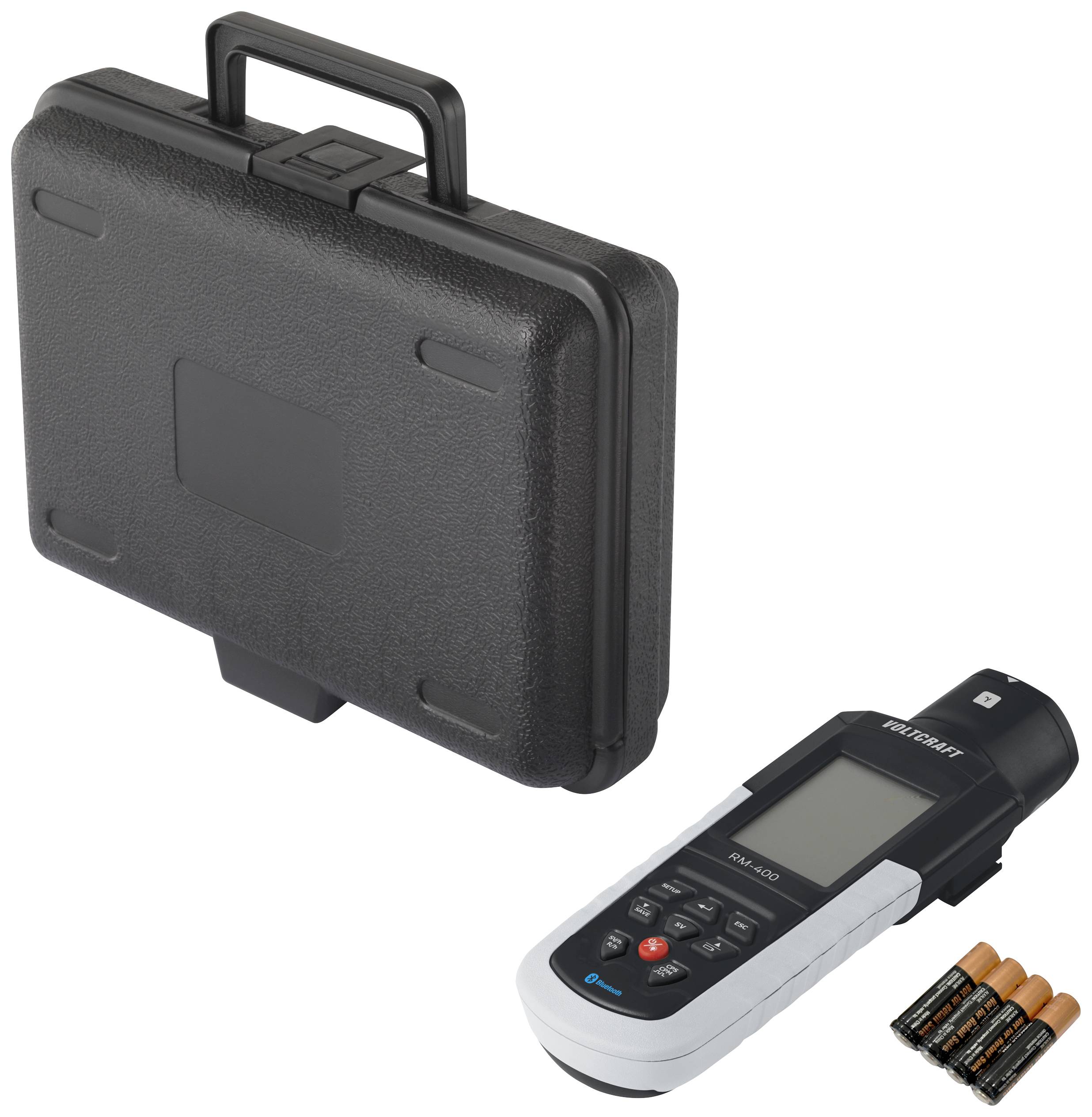Digital light meter with display, button controls and batteries next to a black carrying case for light measurement.