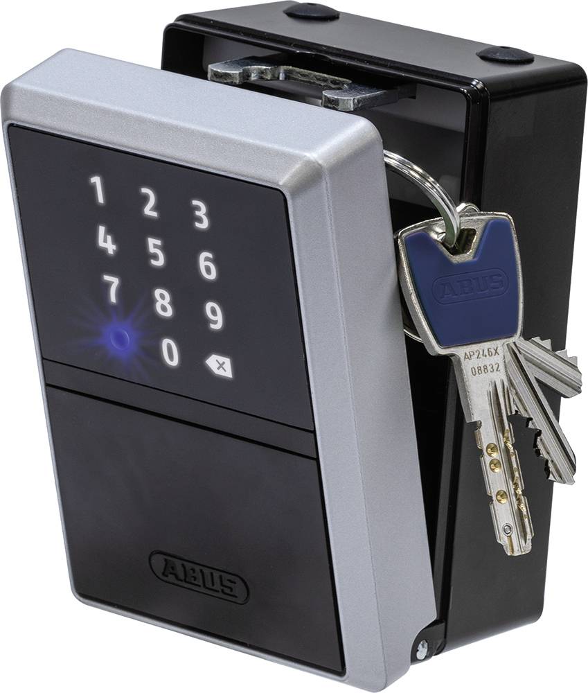 Electronic keypad door lock, glowing blue. A bunch of keys hangs nearby, indicating an additional security element.