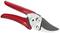 Red secateurs with a shiny blade, suitable for cutting small branches and plants.