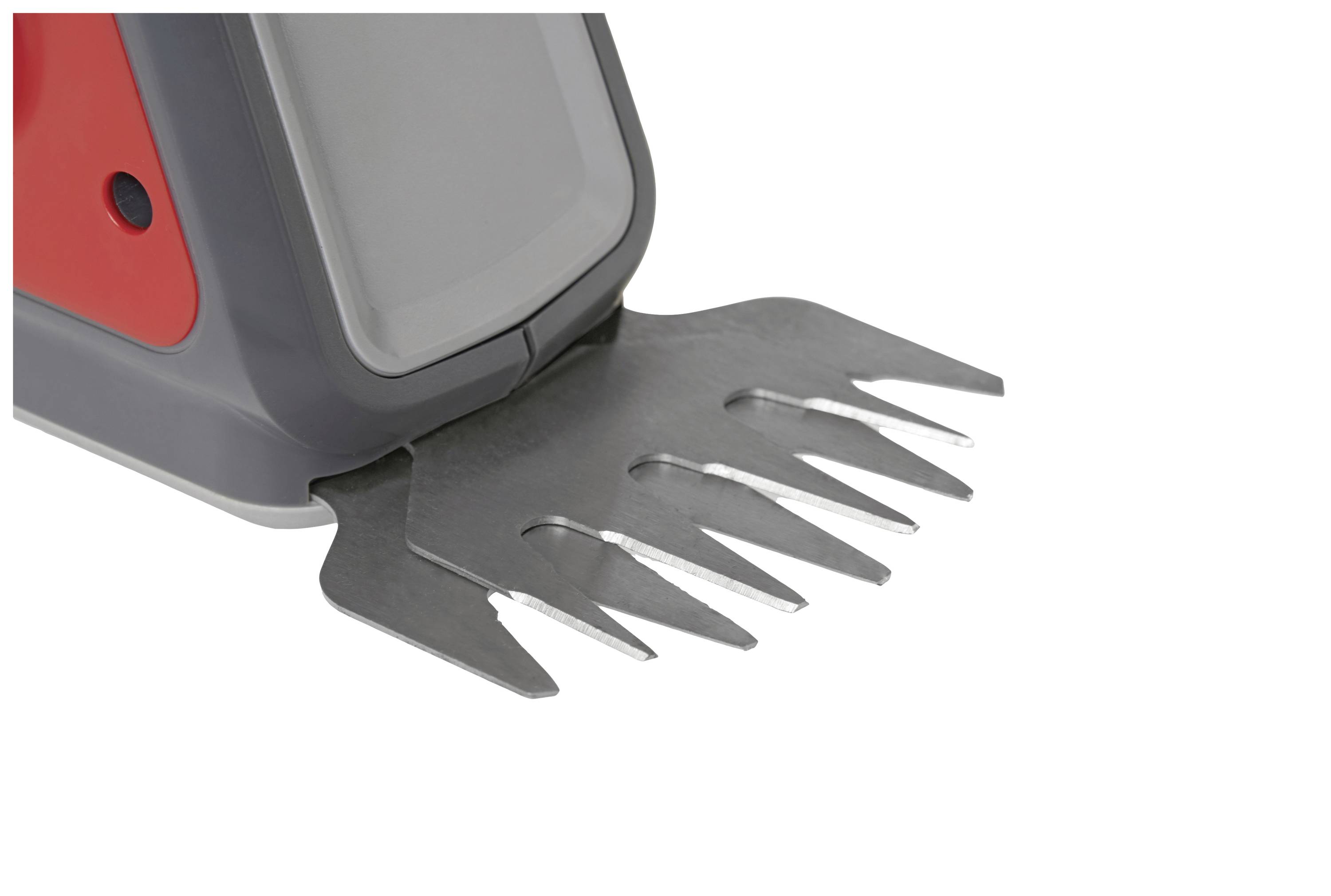 Electric garden tool with metal blades, designed for trimming hedges or bushes. Blades are sharp and serrated.