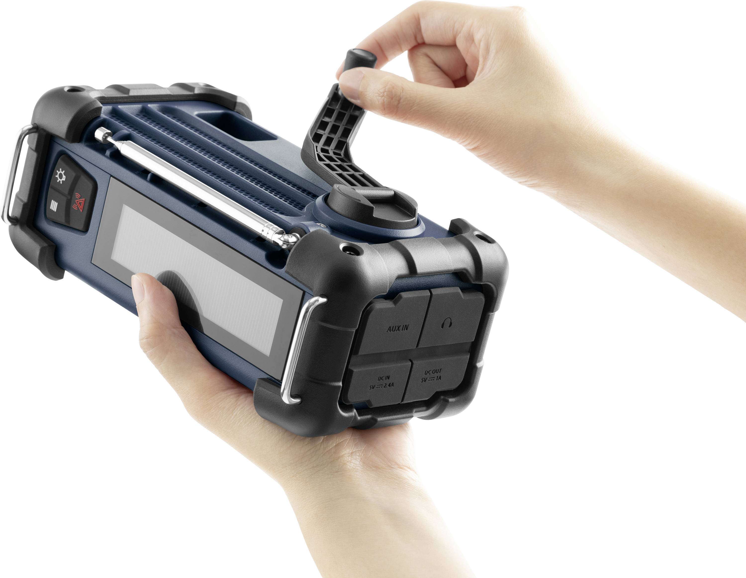 A person is holding a portable blue device with a handle that looks like a radio or speaker.