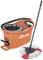 Orange bucket with a black handle and a wringer attachment. Beside it, a mop with a red and white head. Brand: Vileda.