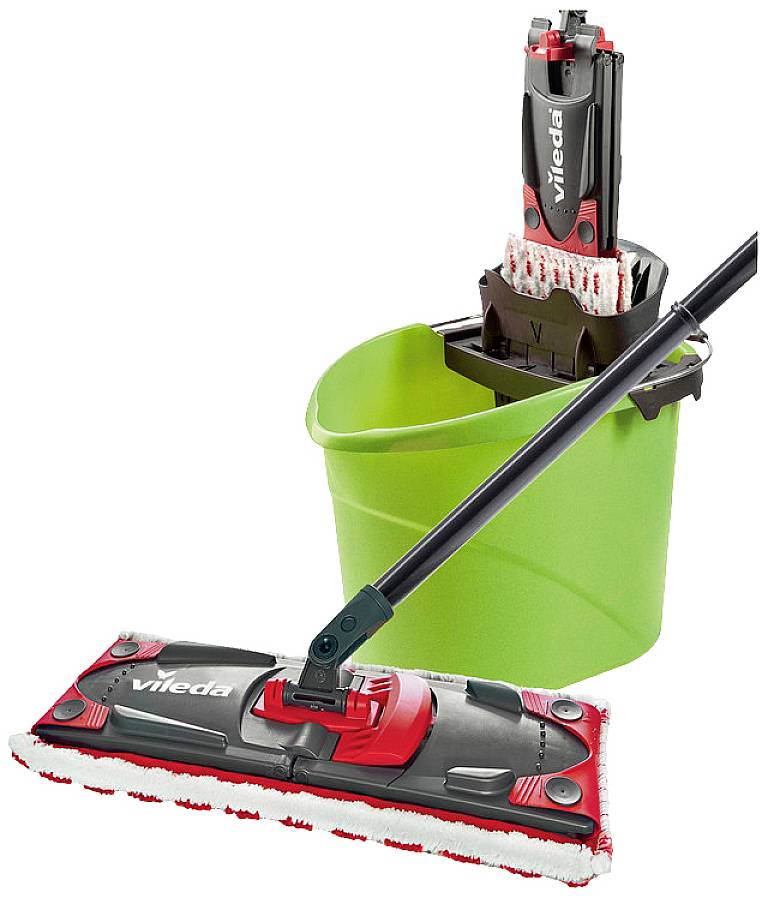 A green bucket with a black and red mop system. The mop is lying on the floor, with the bucket positioned behind it.