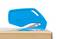 A blue safety cutter is cutting packaging material. The tool has a guarded blade to prevent injuries.