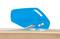 A blue cardboard cutter from Secumax is resting on the edge of a parcel. The cutter has a bevelled edge and two holders.