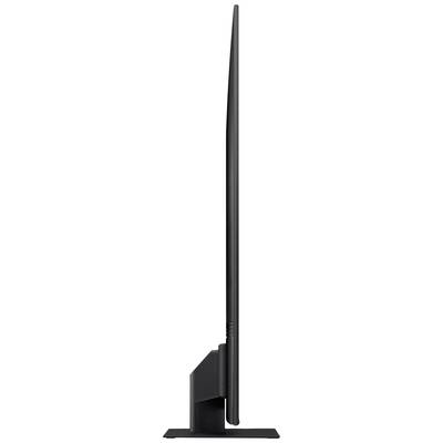 Side view of an ultra-thin monitor on a narrow stand, showcasing its sleek construction and minimalist design.