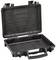 Black, open plastic case with handle and robust locks, empty interior, suitable for secure transportation of items.