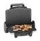 A contact grill open with sausages, peppers and tomatoes on the grill plate. Perfect for grilling vegetables and meat.