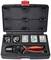 A black toolbox with an open lid shows a crimping plier, inserts and connecting elements in various compartments.