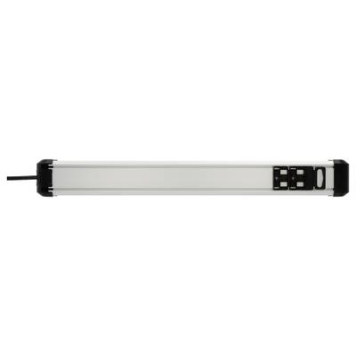 Side view of a long silver-and-black linear device with a cable on the left and a connector module on the right.