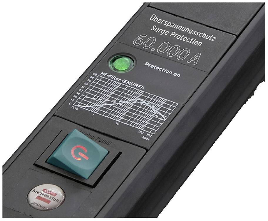 A surge protection device with a green LED display showing active 'Protection on' and a main switch.