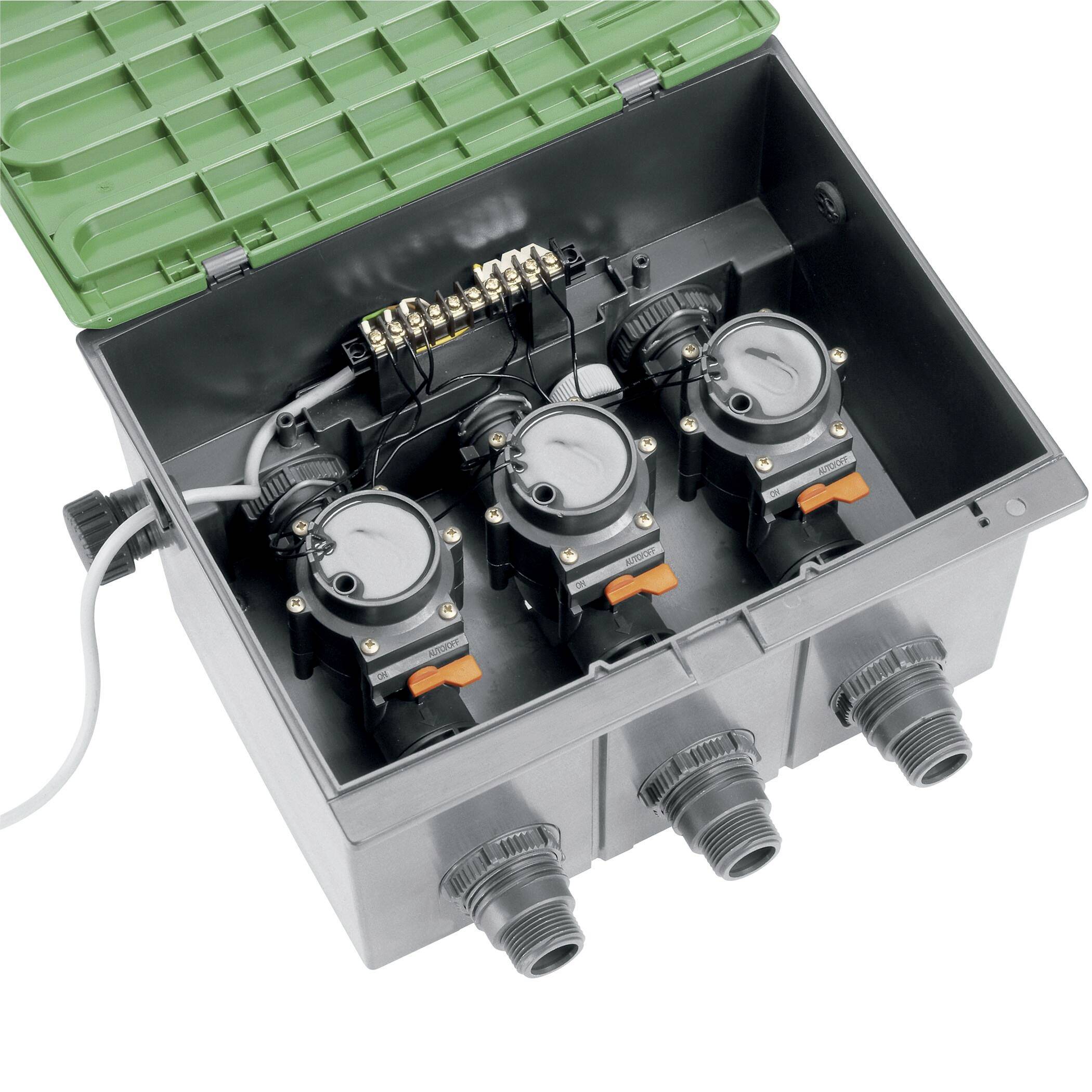 Plastic container with green lid, containing three water valves with timer switches and electrical connections, for irrigation control.