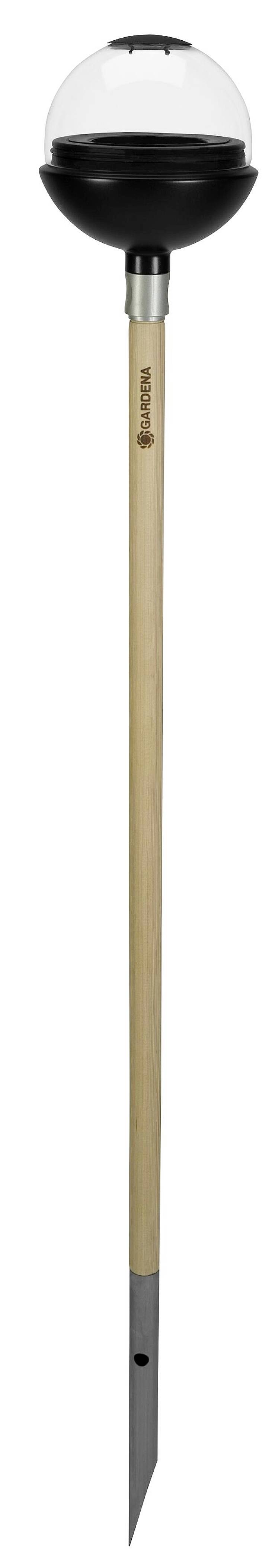 A solar lamp post with a long wooden handle and a black, dome-like light fitting on top. Suitable for garden lighting.