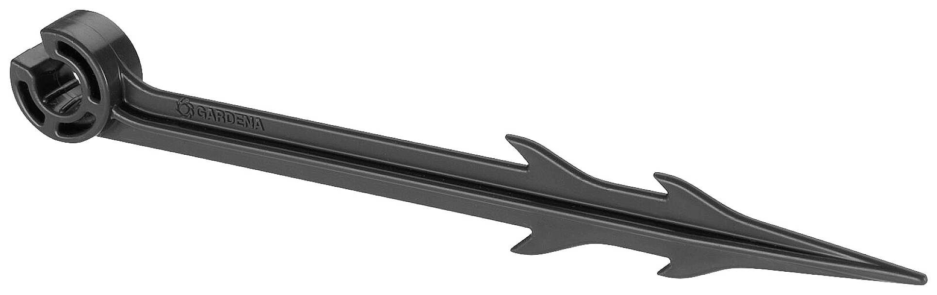 A black plastic ground stake with a point and a serrated shaft, for securing irrigation hoses in the garden.