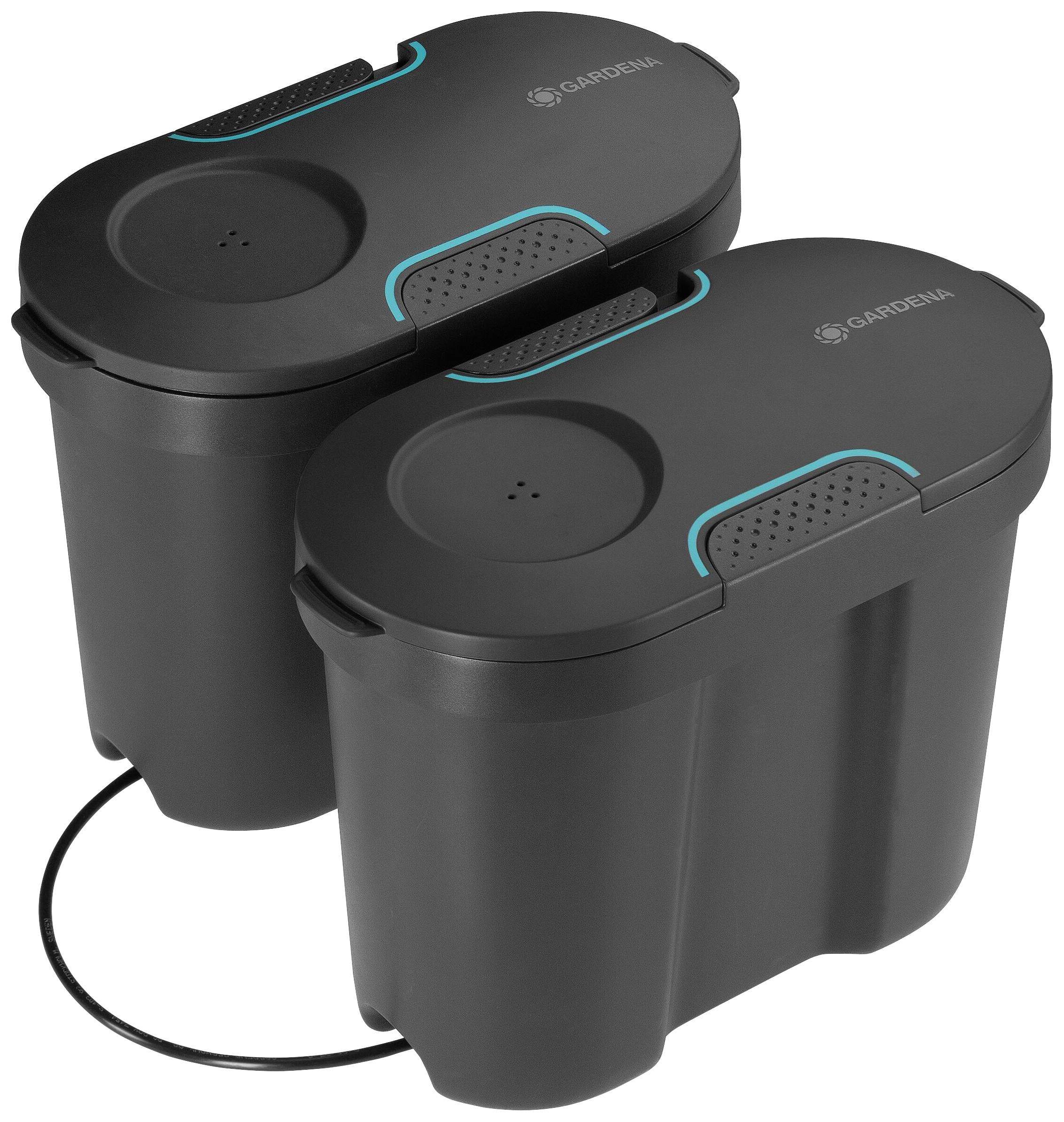 Two black, oval irrigation regulators with blue detail, placed side by side, by Gardena, for garden watering.