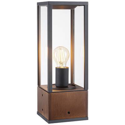 A modern table lamp with glass panels and a visible light bulb on a brown, cube-shaped base.