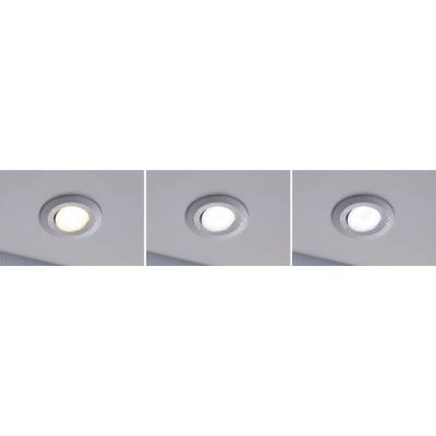 'Close-up of three recessed spotlights in a ceiling, showing different light tones: warm white, neutral white, and cool white.'