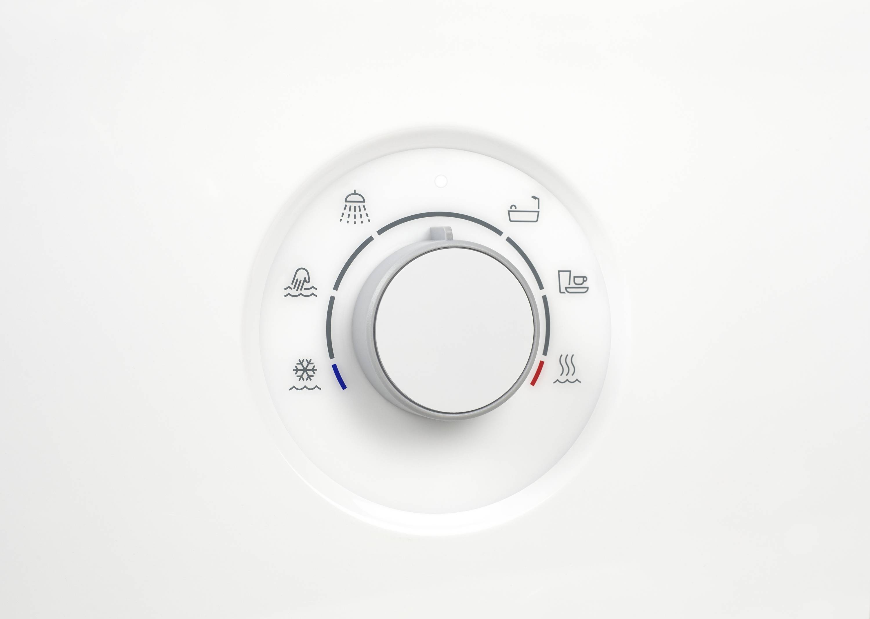 A rotary control knob for adjusting the water temperature. Symbols for shower, bath, hot and cold water are arranged around the knob.