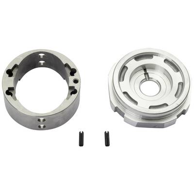 Two metallic machine parts and two small cylindrical pins on a white background. The parts are round and have various openings and indentations.