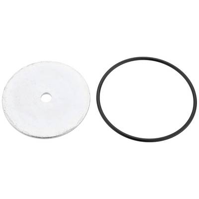 A round metal disc with a hole in the centre next to a black rubber ring, on a white background.