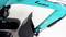 A turquoise mini-excavator with a black bucket arm and tracks, against a white background.