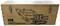 Wooden crate with printed excavator schematic and the inscription 'R/C Fully functional HYDRAULIC EXCAVATOR G101H'.