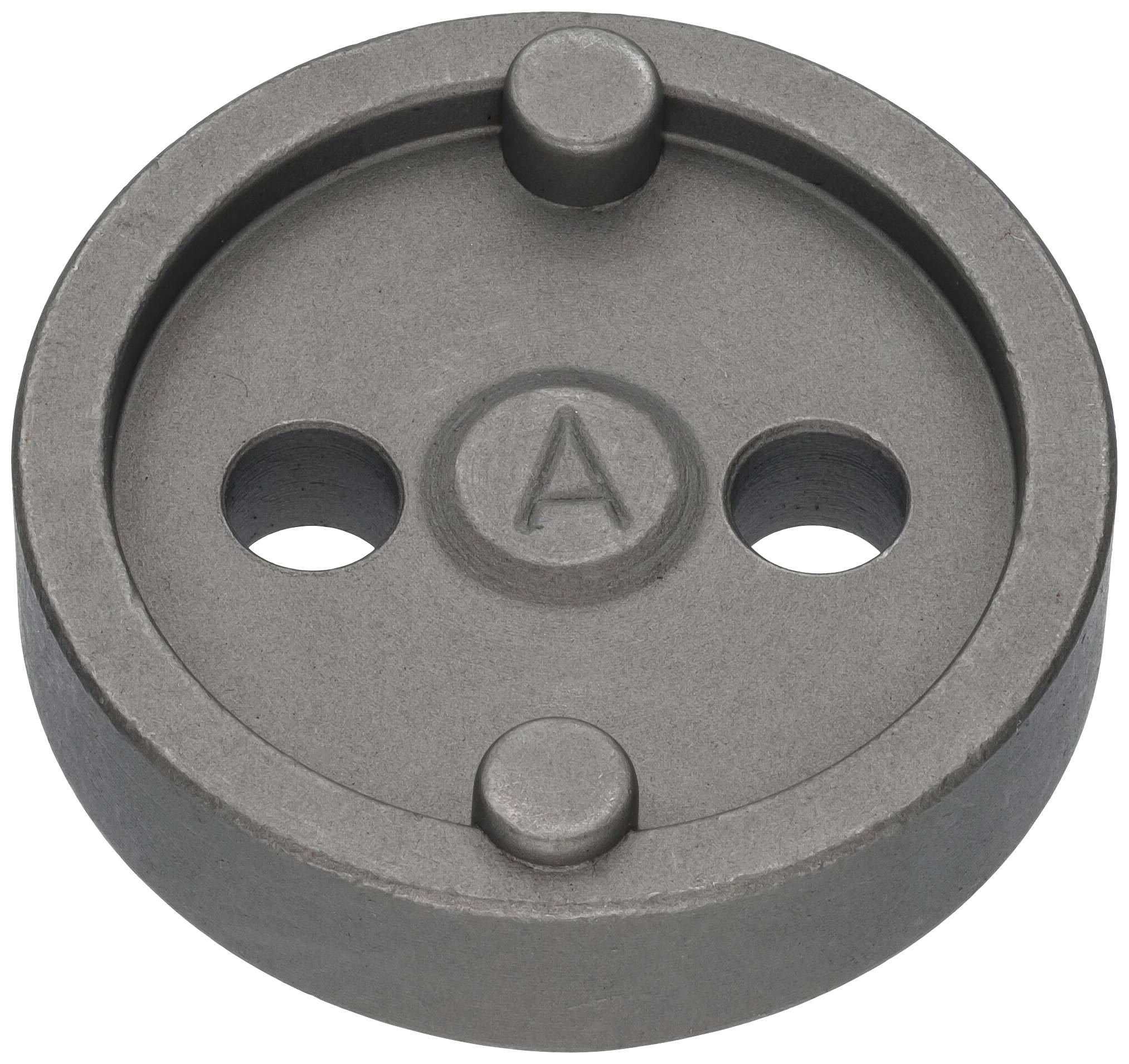 'A round metal plate with three recesses and a letter "A" embossed in the centre.'<br><br>Note: I've used the British spelling of "centre" and ensured the translation maintains the original description's precise language.