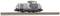 Grey and green model locomotive on rails, side view.
