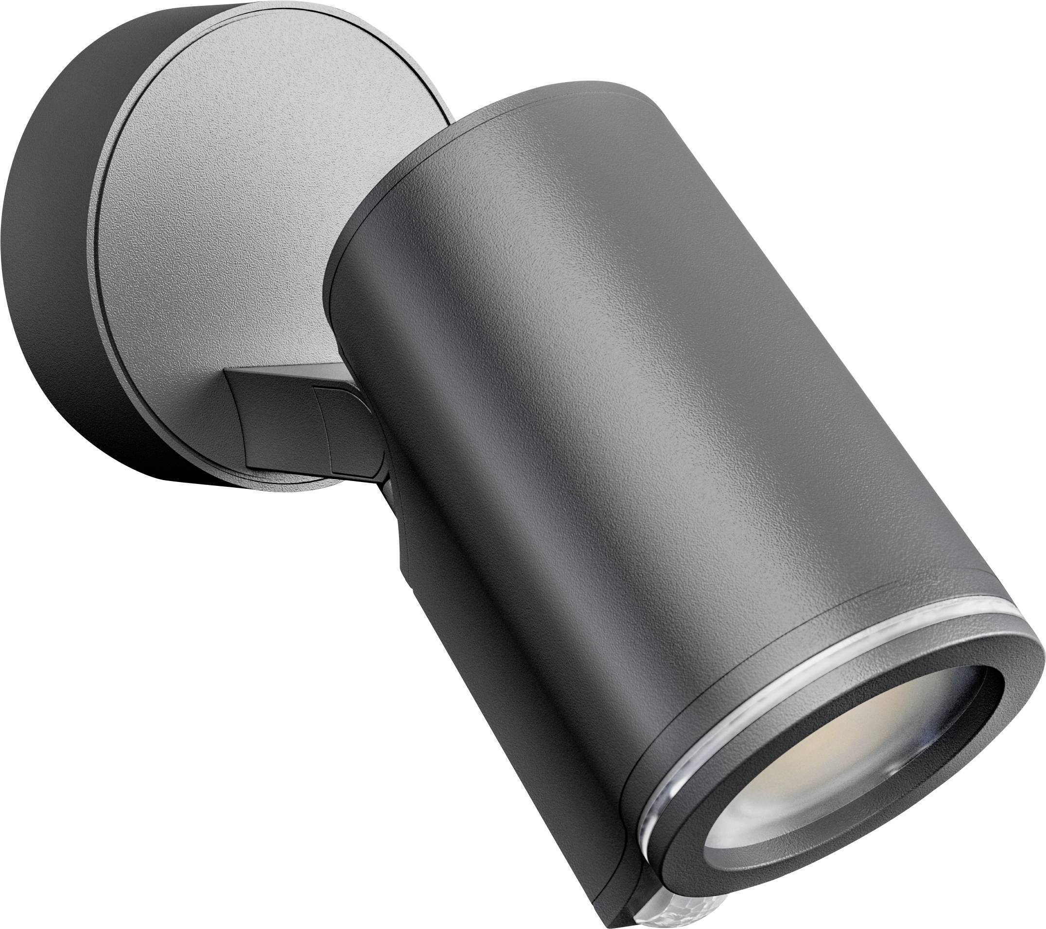 Black adjustable wall-mounted spotlight angled downward on a round base.<br>