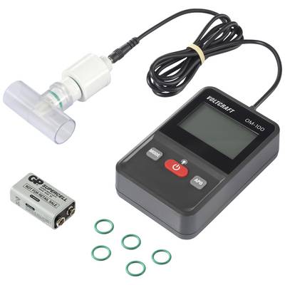 Electronic device with a display and buttons, connected to a breath sensor. Beside it lie a battery and several green sealing rings.