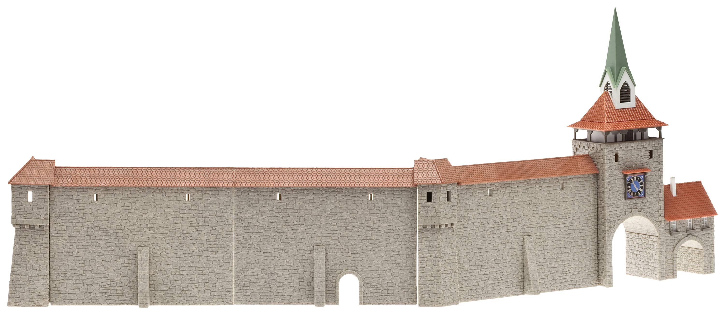 'Model of a medieval city wall made of brick with a tower and clock. The tower has a green pointed roof.'